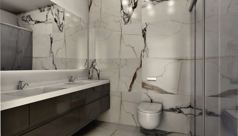 Siyah damarlı beyaz seramik duvar, koyu lavabo dolabı, asma klozet ve cam duşakabin